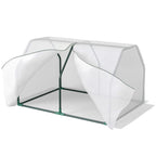 Mini greenhouse with white mesh cover and green steel frame, end door partially open