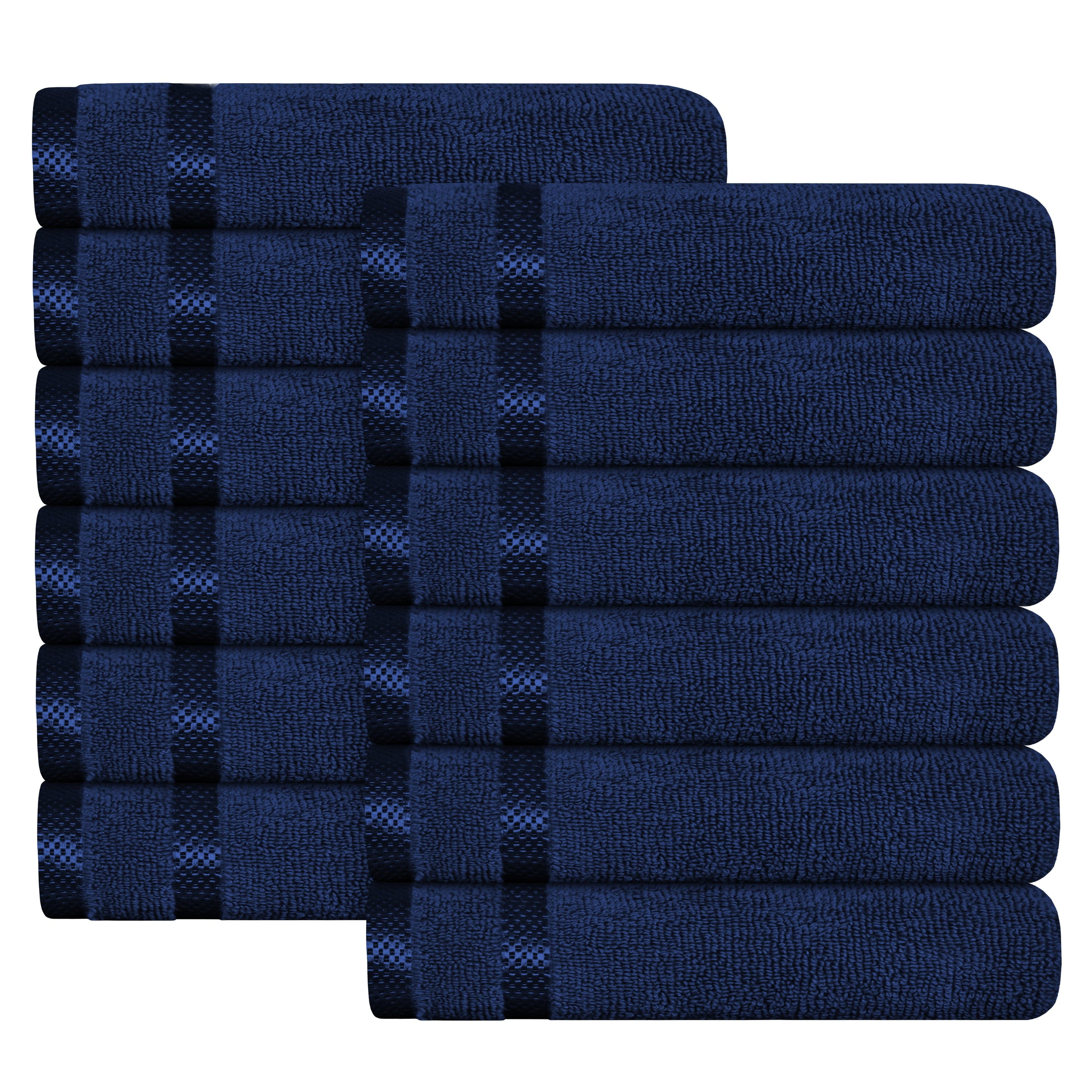 Royal blue striped cotton towel set, folded towels stacked in a bale
