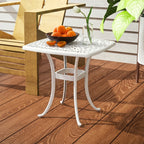 White patio end table with lattice tabletop, umbrella hole, four curved legs