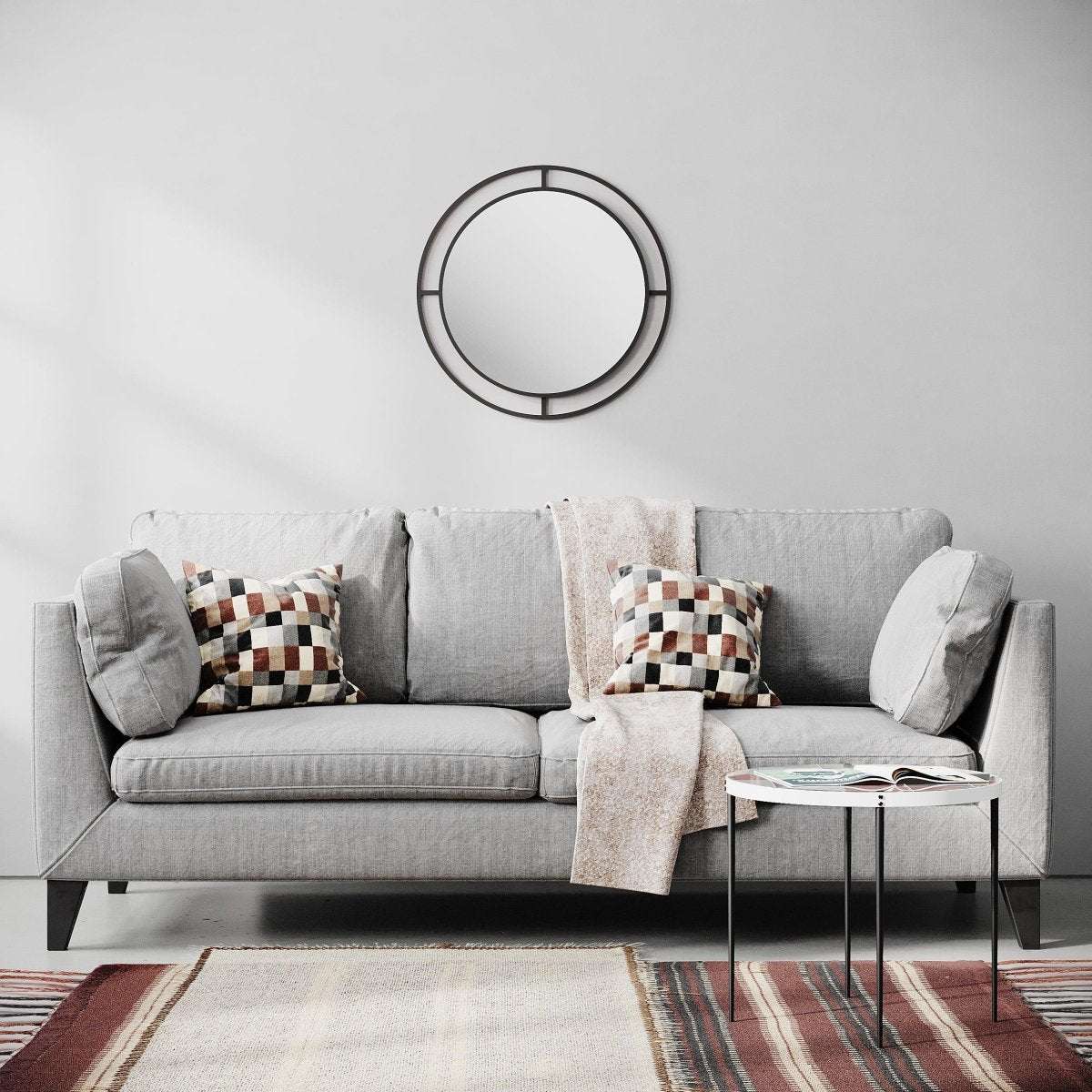 Round wall mirror with black concentric ring frame