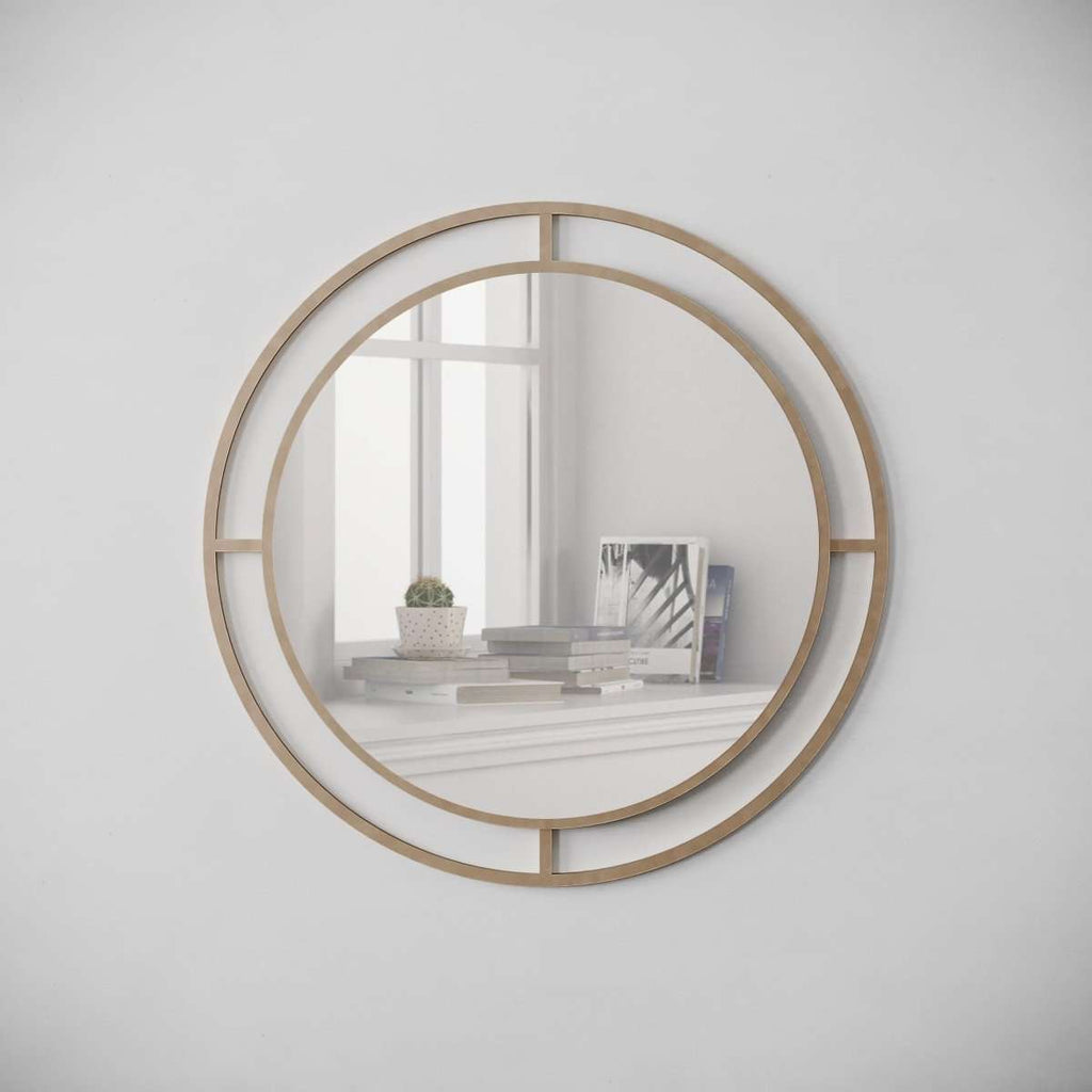 Round wall mirror with gold metal ring frame and inner grid