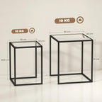 Two black nesting tables with square tempered glass tops and open steel frames