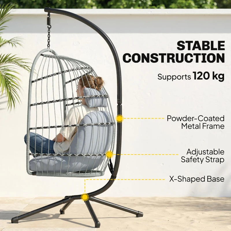 Light grey hanging egg chair with powder-coated metal frame and safety strap
