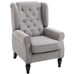 Light grey wingback armchair with button-tufted back and rolled arms