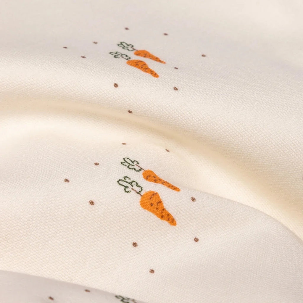 Cream fabric with small carrot animal pattern