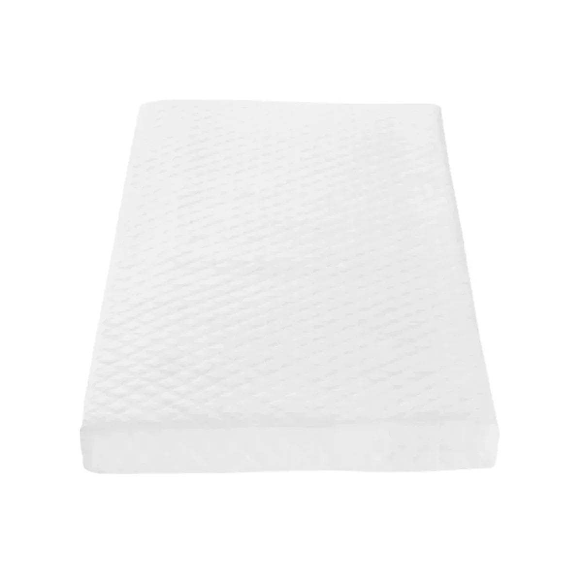 White quilted cot mattress topper with raised sides and textured surface
