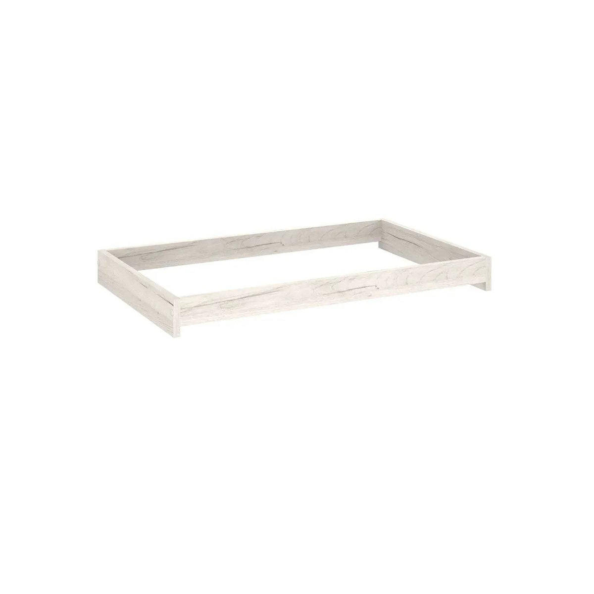 White baby changing unit top frame with shallow side walls, light wood finish