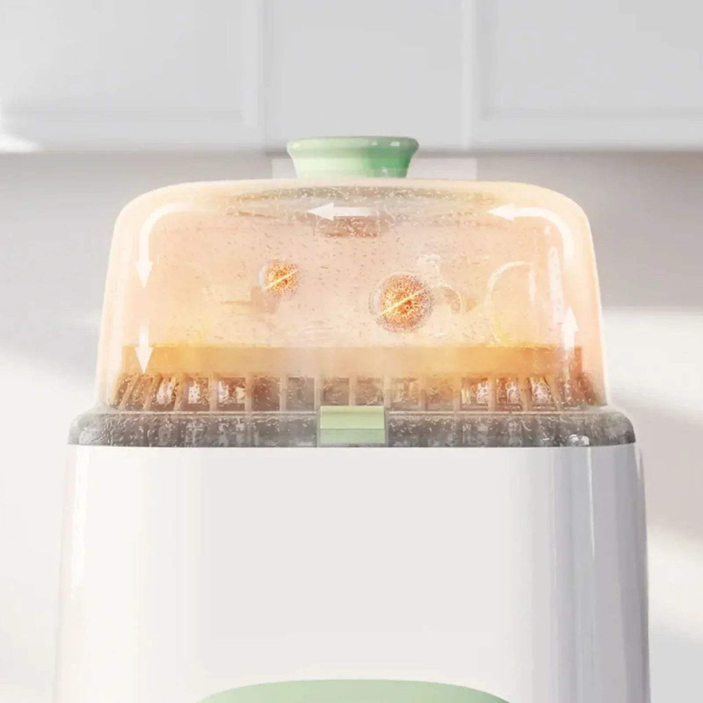 Baby bottle washer sterilizer dryer, clear lid over white unit with drying chamber