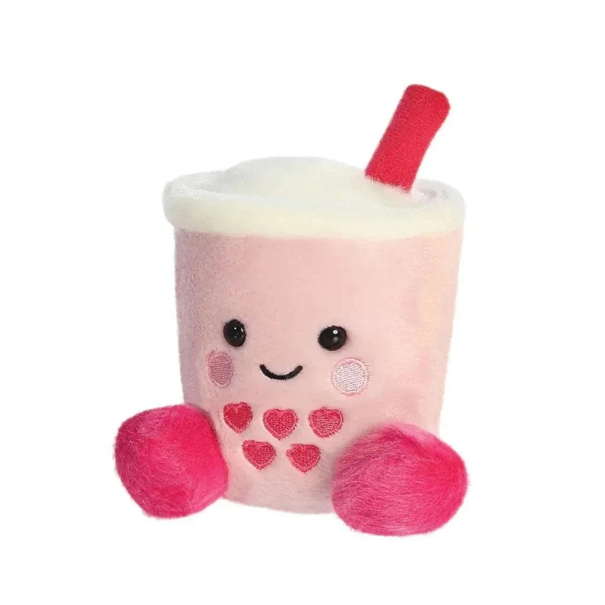 Heart boba plush drink toy with red straw, stitched smile, and pink fuzzy arms.