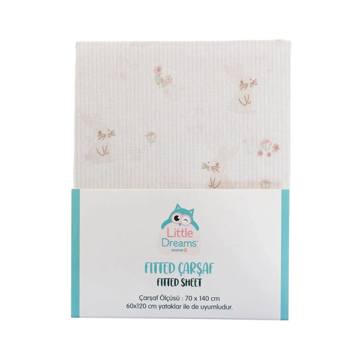 Packaged Little Dreams fitted sheet in white with small pastel floral pattern