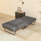 Single folding bed with dark grey mattress, black metal frame, and caster wheels for mobility
