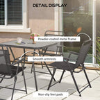 Black outdoor dining table with umbrella hole and folding mesh chairs, metal frame