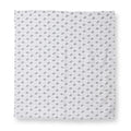 White muslin baby blanket with small gray elephant and star print