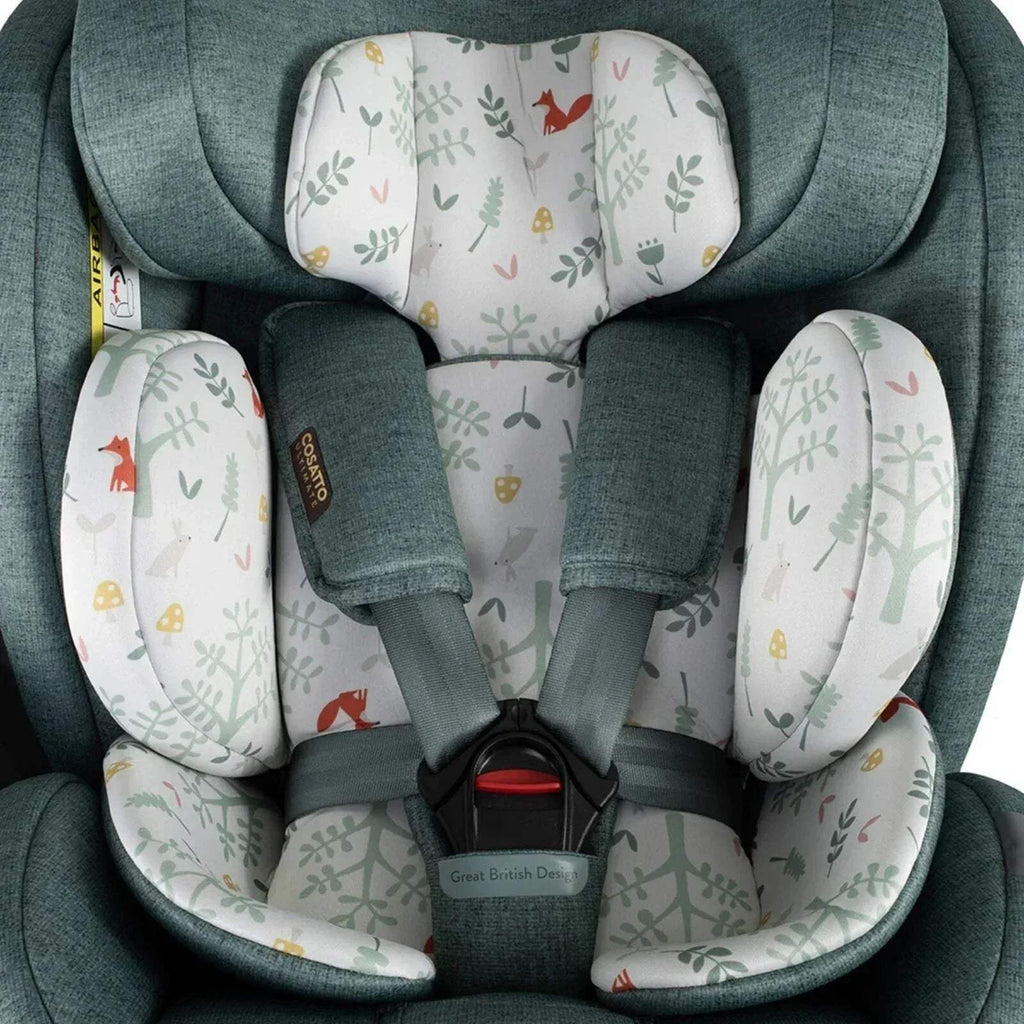 Close-up of teal infant car seat with woodland animal print inner padding and harness pads