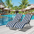 Two blue and white striped folding sun loungers with padded cushions and metal frames