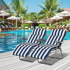 Two blue and white striped folding sun loungers with padded cushions and metal frames