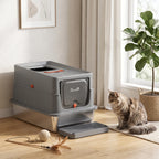 Dark grey enclosed cat litter tray with lid and step, with cat and carrying scoop