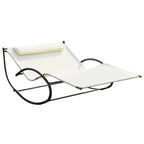 Cream two-person rocking sun lounger with headrest pillow and black armrests