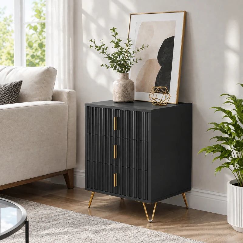Black 3-drawer dresser with fluted fronts, gold bar handles, and gold metal legs.