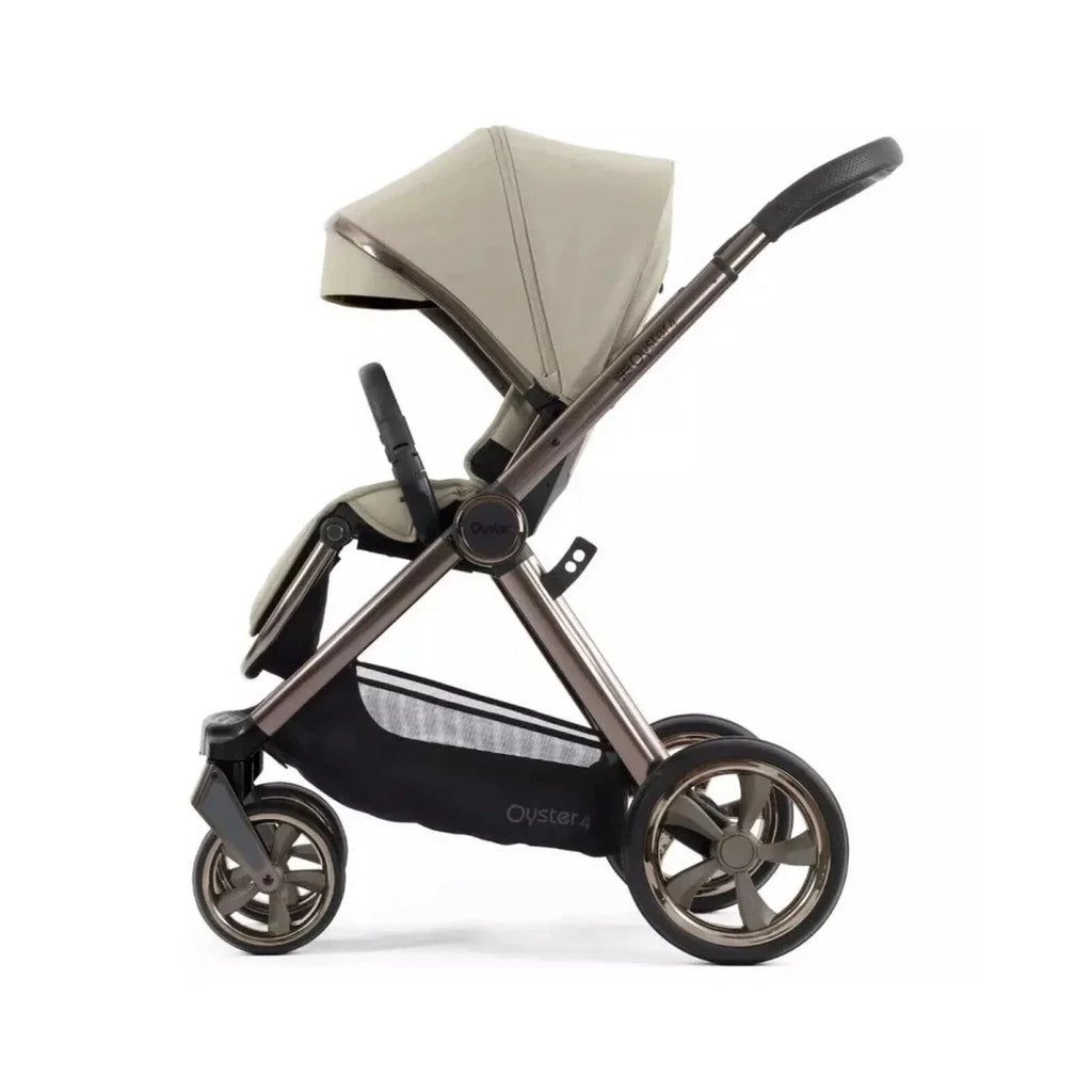 Single stroller with buttermilk canopy and black handlebar, front three-quarter view