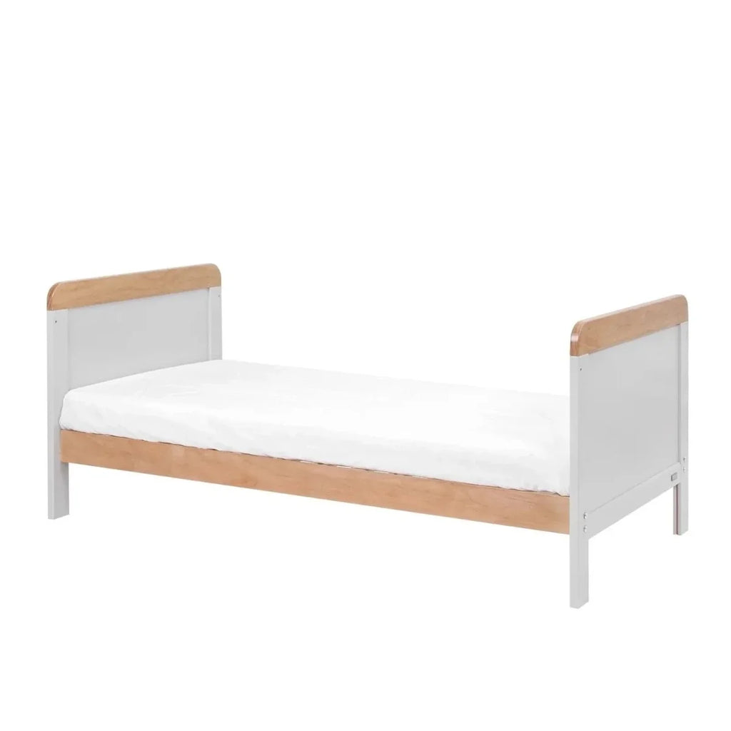 Junior bed cot frame with dove grey sides and honey oak top panels, white mattress