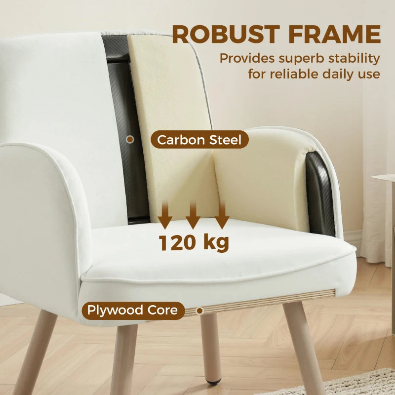 Cream velvet armchair with padded seat, sturdy frame, and wooden legs