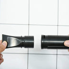Two dryer nozzle end pieces in black, showing flexible connection joint