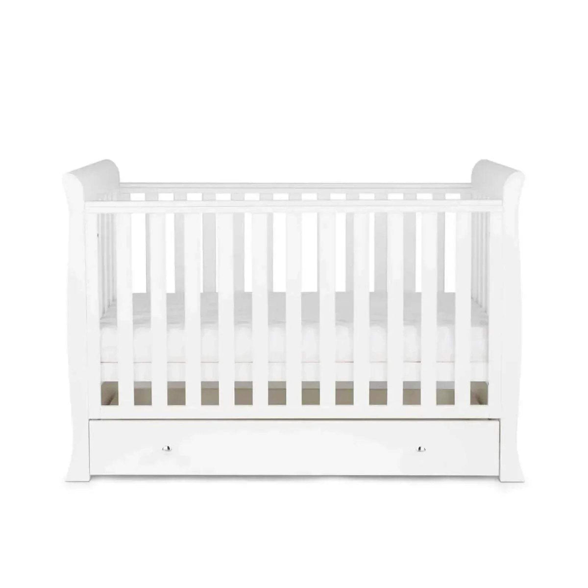 White baby crib with slatted rails and single drawer front panel