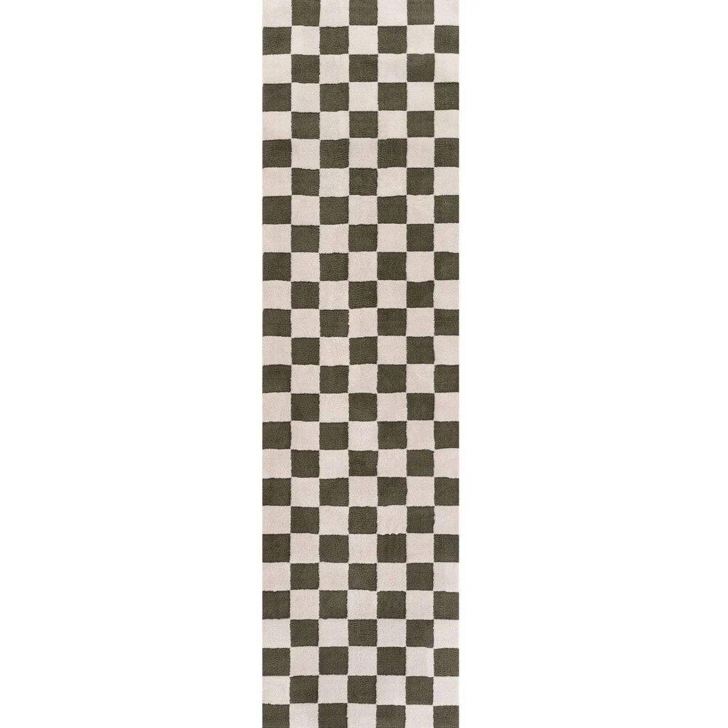 Vertical view of a white and dark green checkerboard rug.