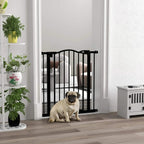 Black pet gate with vertical bars, fawn dog resting behind the safety barrier in doorway