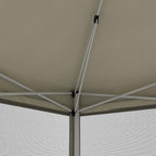 Pop-up gazebo ceiling with white support frame and hanging clips, tan canopy top.
