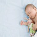 Crib fitted cotton jersey sheet with smooth plain surface
