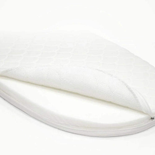 White oval mattress side view with stitched edge and textured fabric