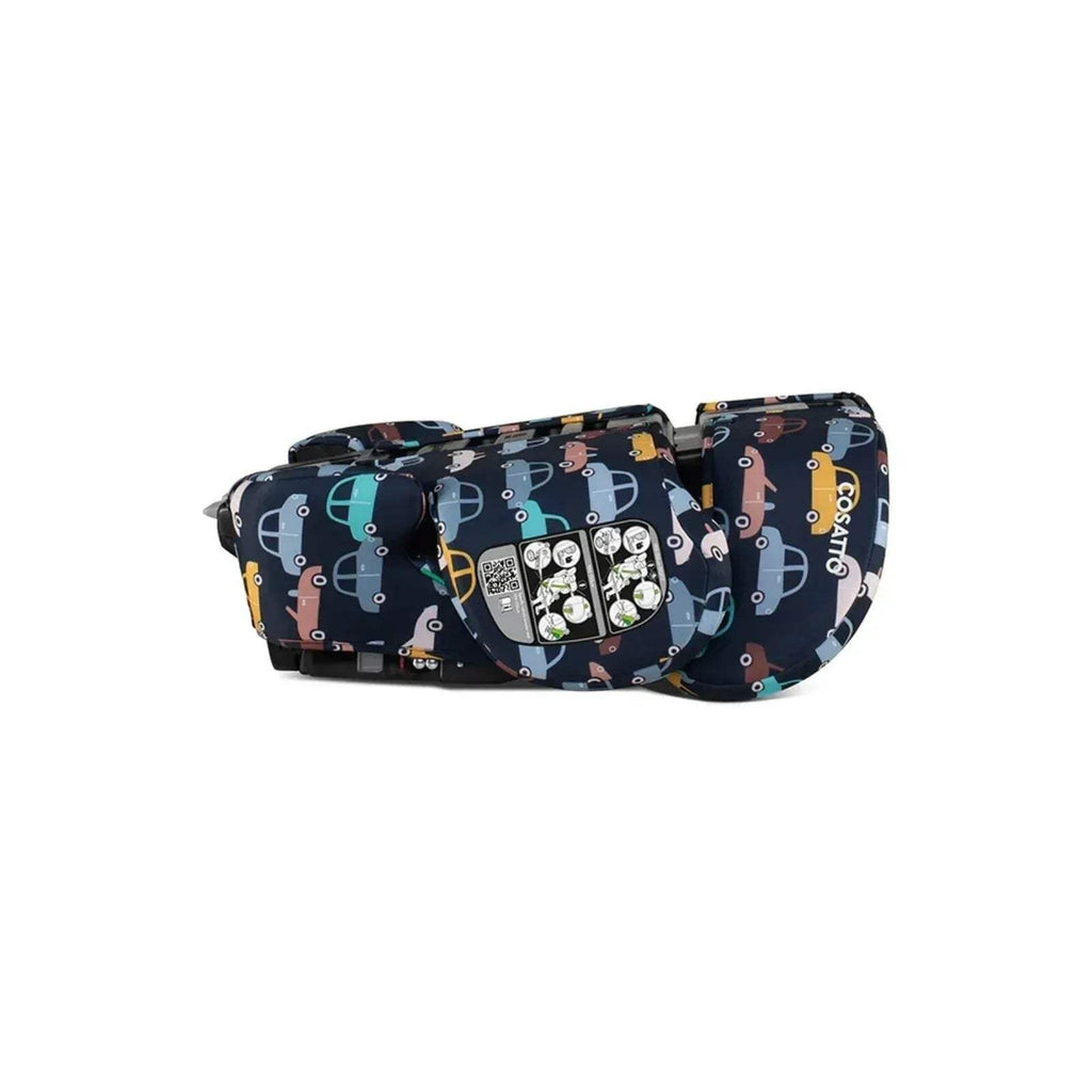 Kids car seat angled view, navy car print cover with harness buckle detail