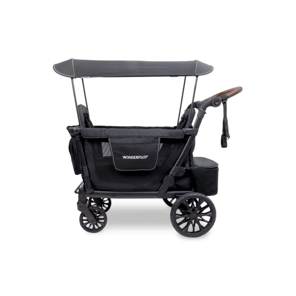 Black quad stroller wagon with canopy, front storage console, and large spoked wheels