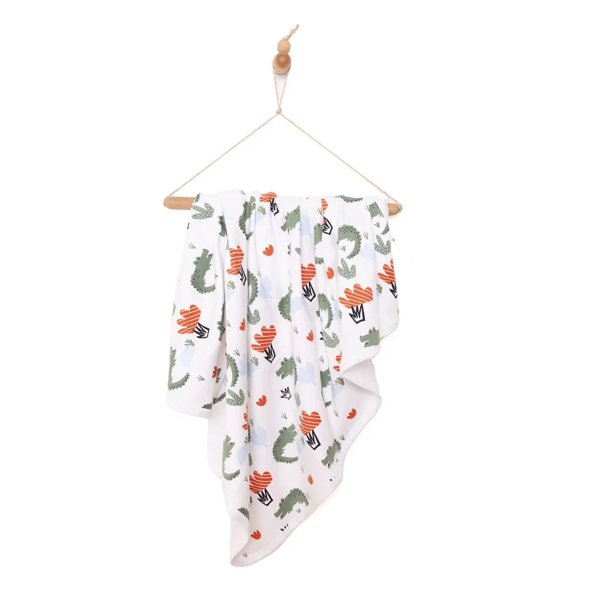 Cactus-print kids blanket draped with repeating arrow and heart patterns