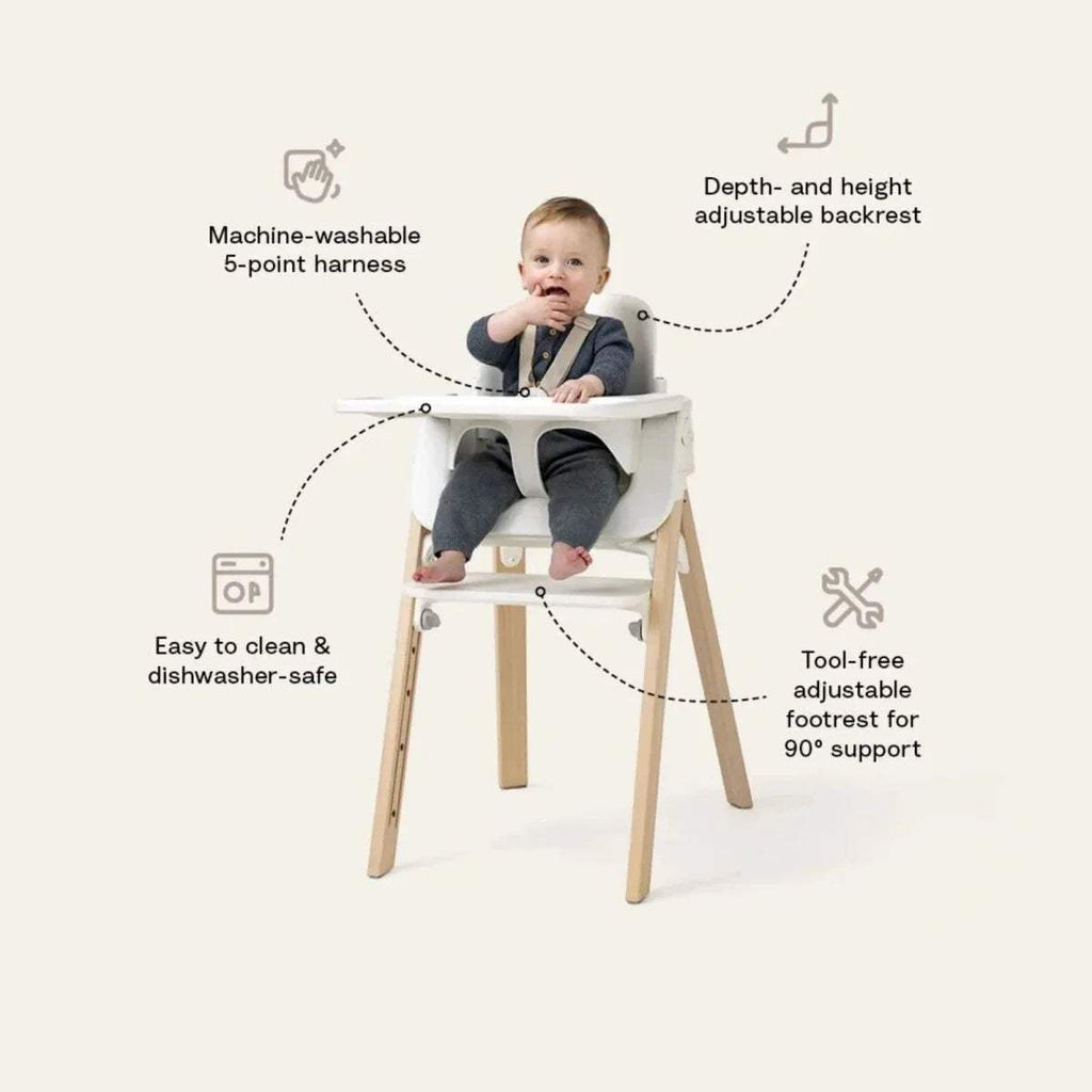 Adjustable black highchair with warm brown wooden frame and rounded seat