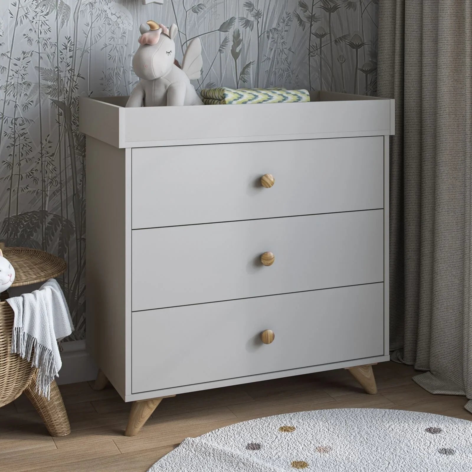 Kids changing dresser in grey with 3 drawers and brass round knobs, front view