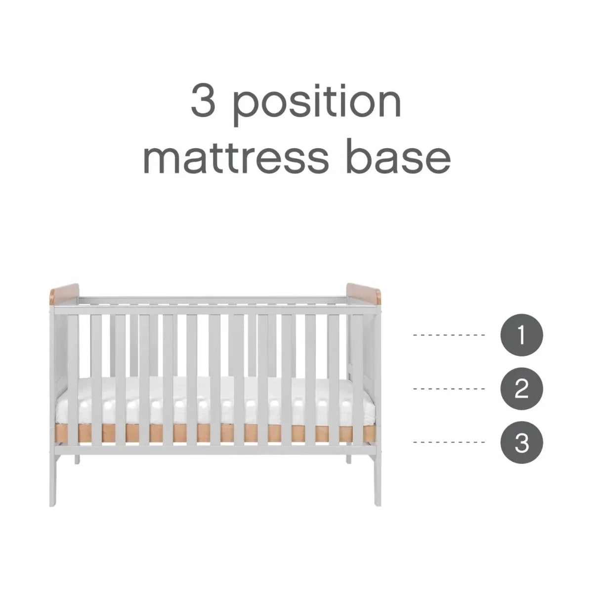 Dove grey cot bed frame with slatted sides and light wood mattress base