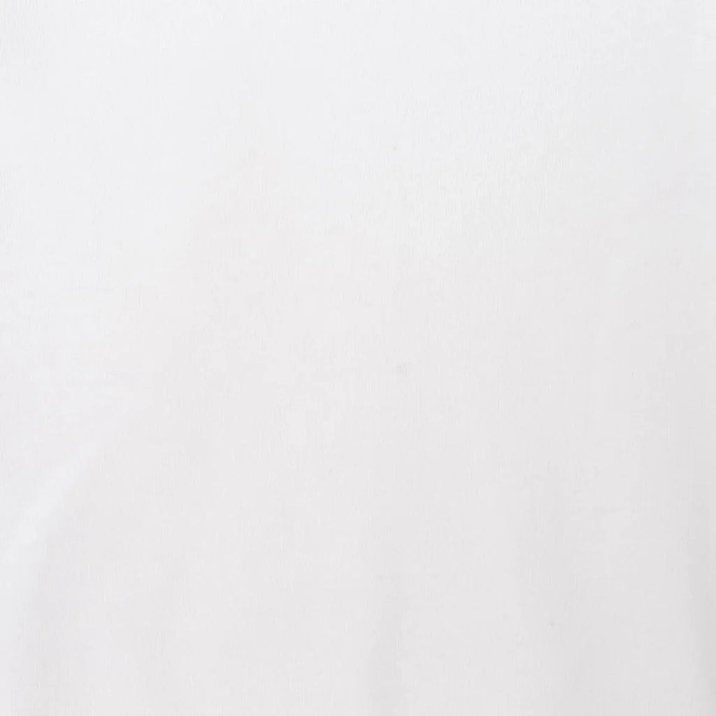 White short-sleeve undershirt fabric close-up, smooth knit
