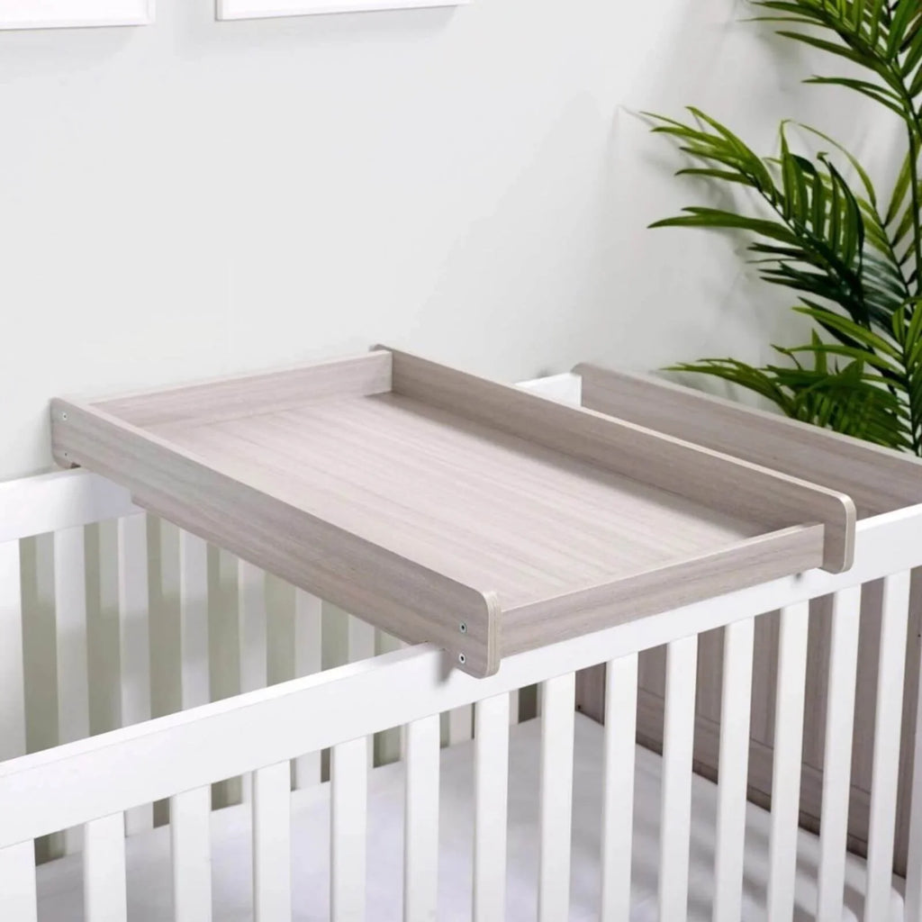 Ash grey cot top changer with raised rails and flat changing surface