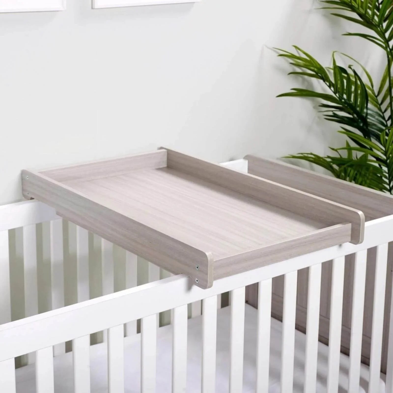 Ash grey cot top changer with raised rails and flat changing surface
