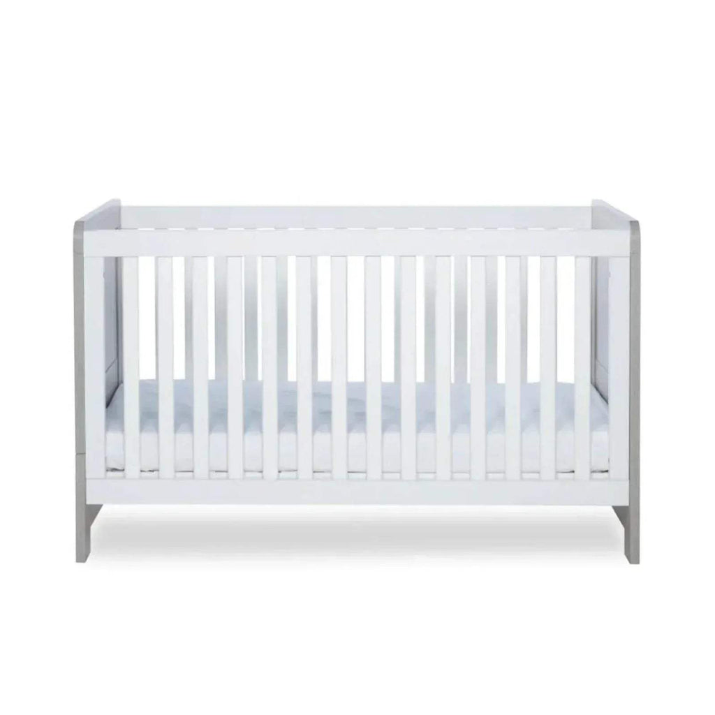 White cot bed with front slats and open frame view