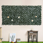 Dark green artificial leaf hedge screen panel with clips, full view of dense foliage.