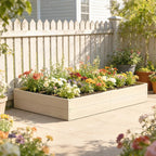 Outdoor wooden raised garden bed planter box on patio with colorful flower plants