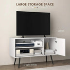White TV media unit with open shelves and striped cabinet door under a TV.