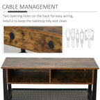 TV stand cabinet with cable-routing holes and two open bays, rustic brown top, black mesh shelf.
