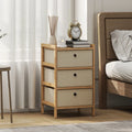 Cream white narrow dresser with bamboo frame, three fabric drawers and round pull handles