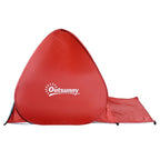 Red pop-up beach tent with peaked roof and open side entrance