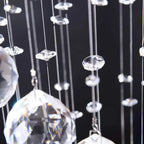 Close-up of crystal bead strands on chrome crystal chandelier pendant